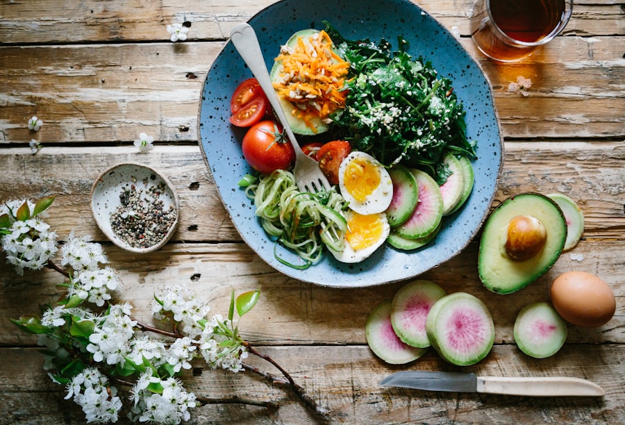 Fresh vegetables, eggs, and greens arranged on a wooden table
